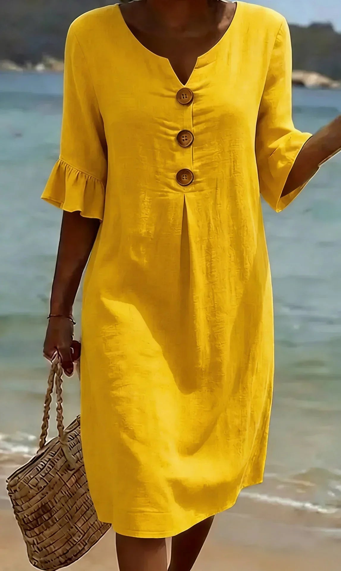 Vanesa | Vestido texturizado con mangas abullonadas y botones